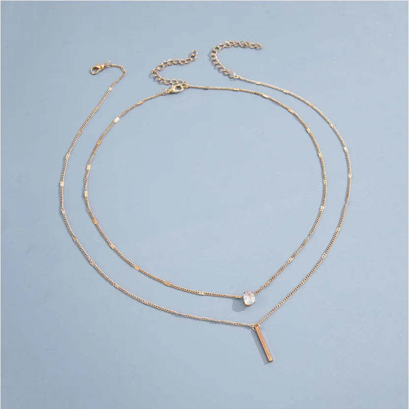 Collier double rang en acier avec pendentif goutte en zircon