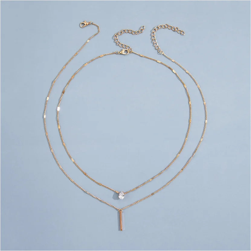 Collier double rang en acier avec pendentif goutte en zircon